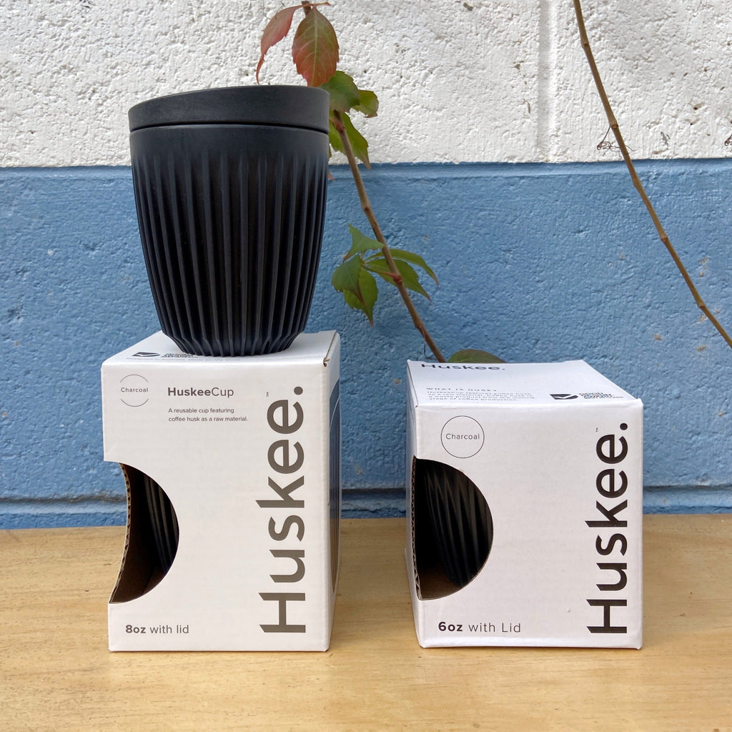 Huskee reusable coffee cup in white packaging
